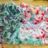 Obra textil: Materiales: hilos de lana de diferentes grosores y colores. Cartón para la base 